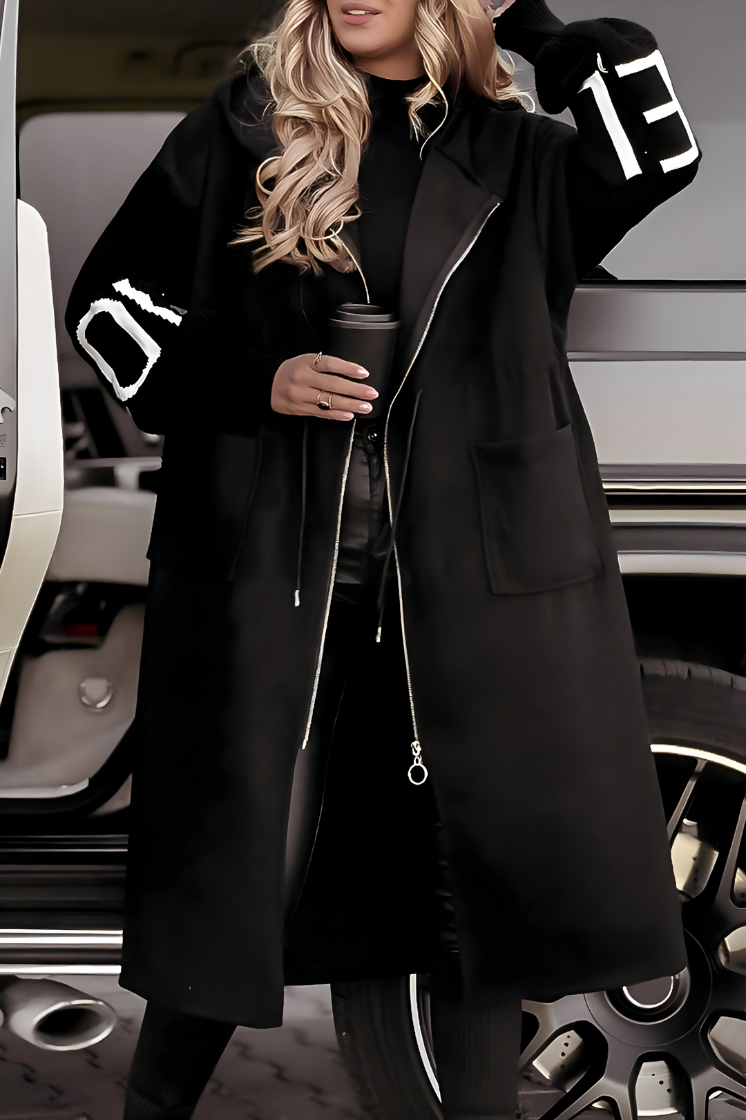 Elwira | Stylish jacket with knitted sleeves and hood